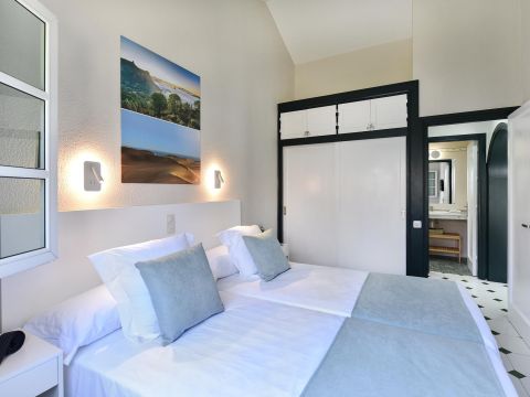 Campo Golf 26: Bungalow Moderno en Maspalomas | VillaGranCanaria Dormitorio 1